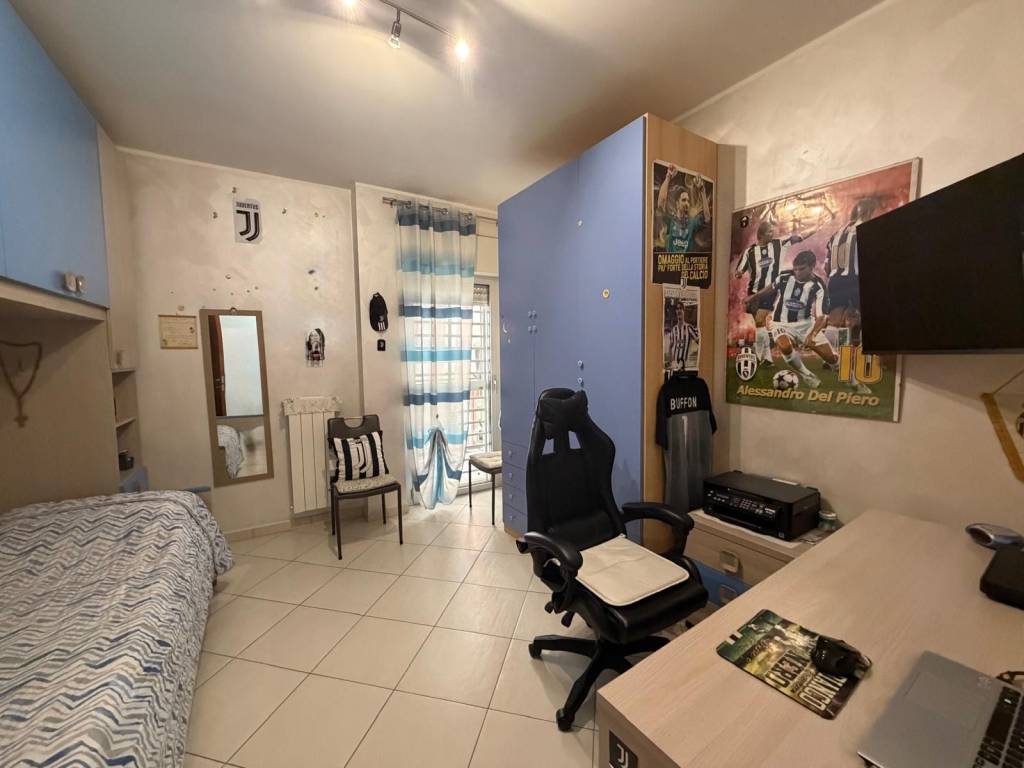 AMPIO TRILOCALE CON POSTO AUTO E CANTINA